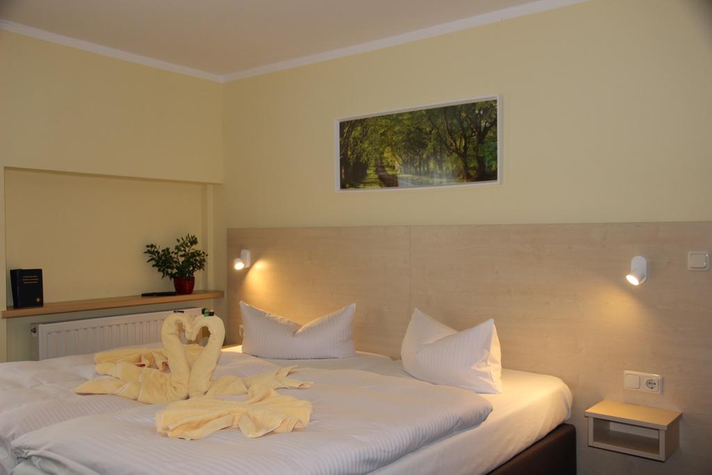 Pension Erdmann - Hotel Garni Χέρινγκσντορφ Δωμάτιο φωτογραφία